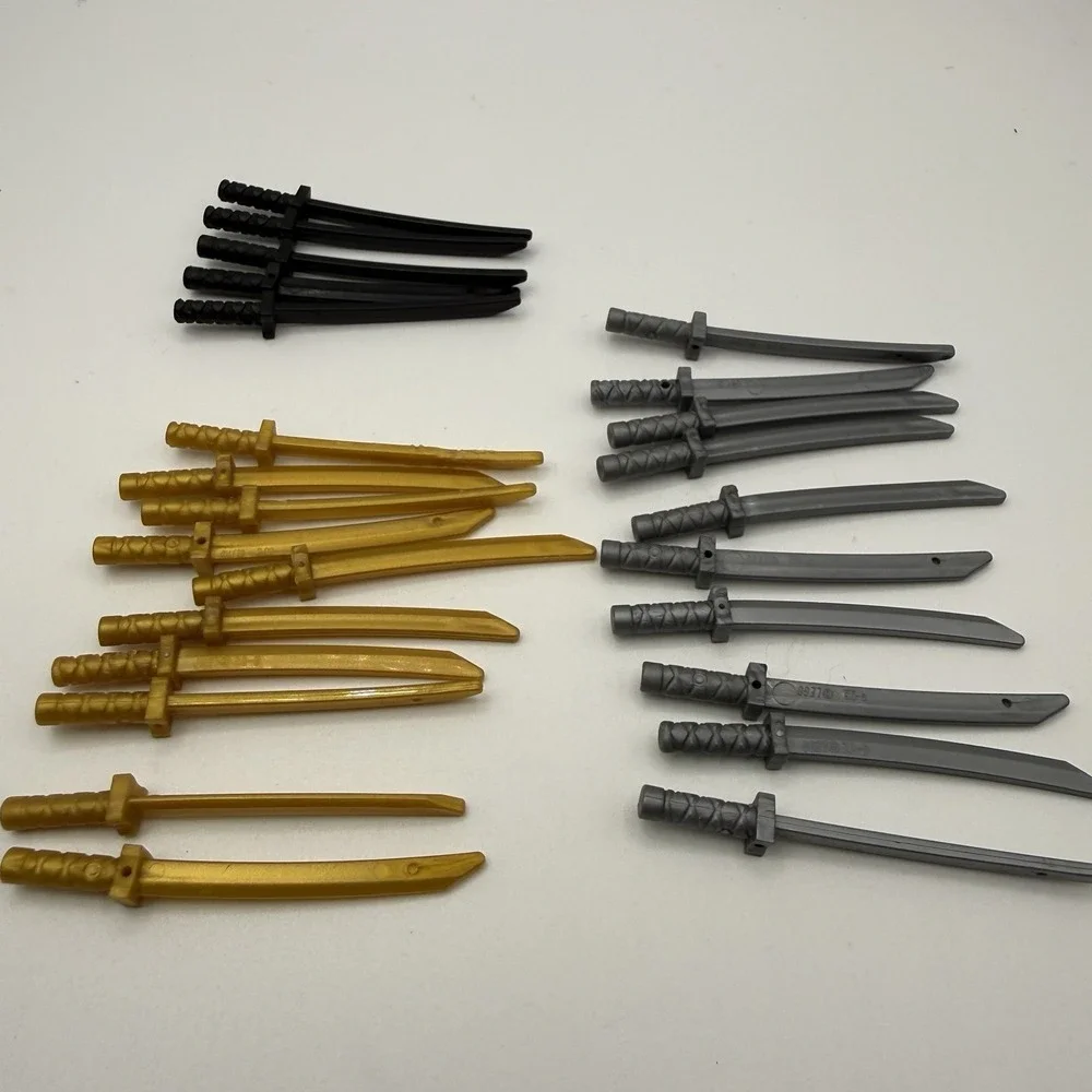LEGO Ninjago Katana Lot 25 Pieces Minifigure Swords 10 Silver, Gold & 5 Black - Picture 2 of 5